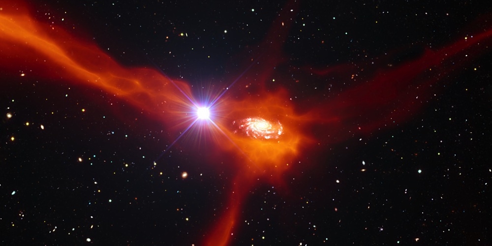 Deze artist’s impression toont een sterrenstelsel in het verre heelal dat bezig is om koel gas (oranje gekleurd) uit zijn omgeving aan te trekken